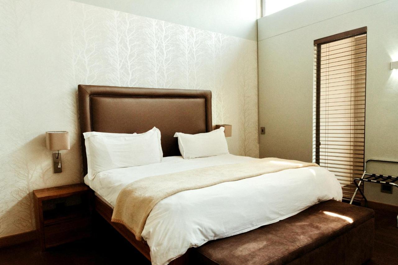 Menlyn Boutique Hotel Pretoria Exterior photo A bedroom