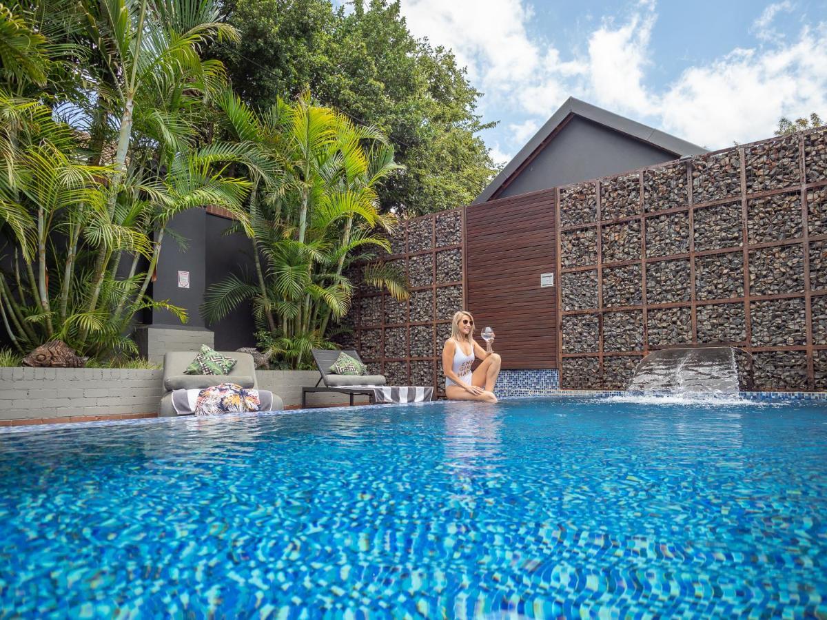 Menlyn Boutique Hotel Pretoria Exterior photo The private pool of a one-bedroom villa