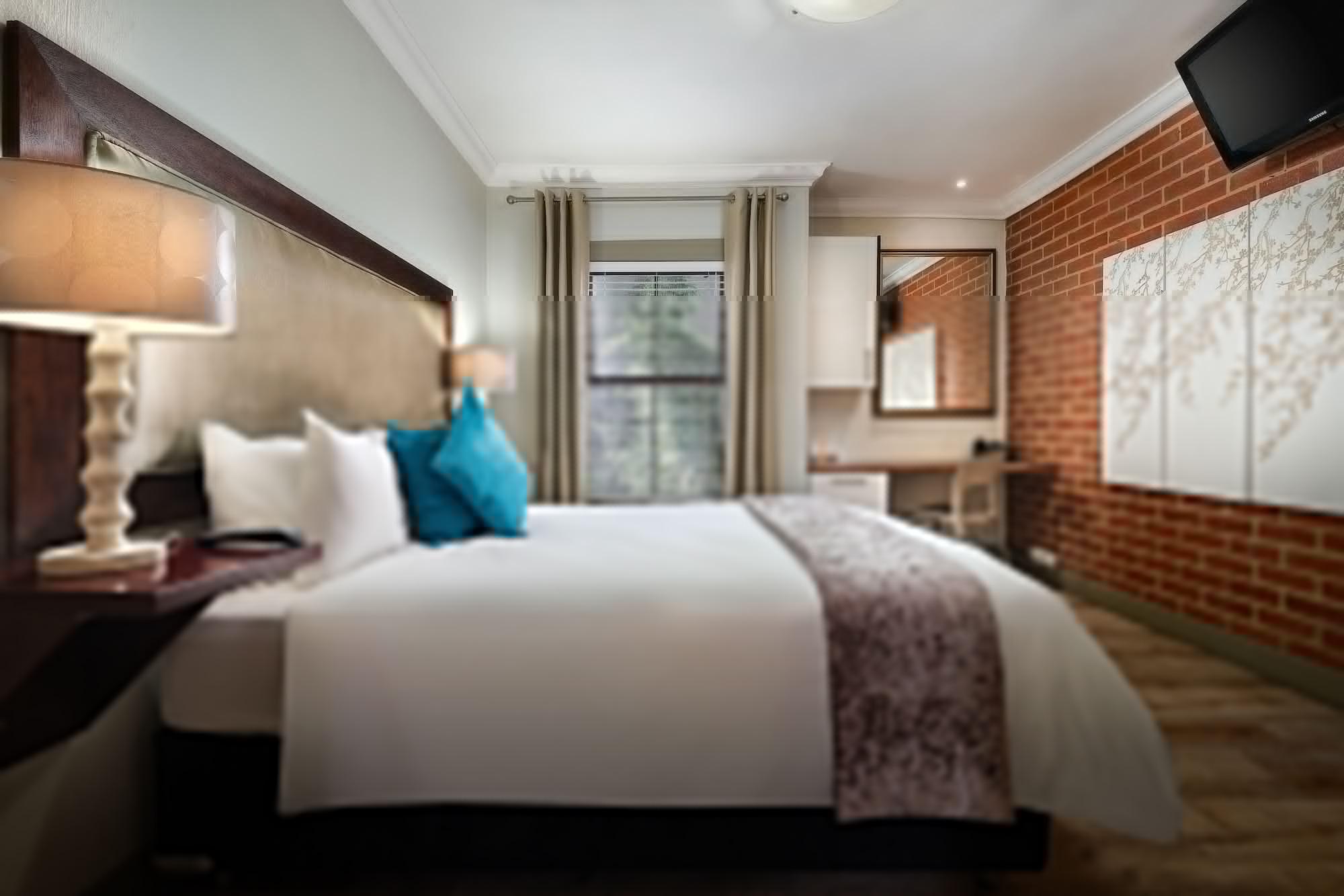 Menlyn Boutique Hotel Pretoria Exterior photo A bedroom at the hotel