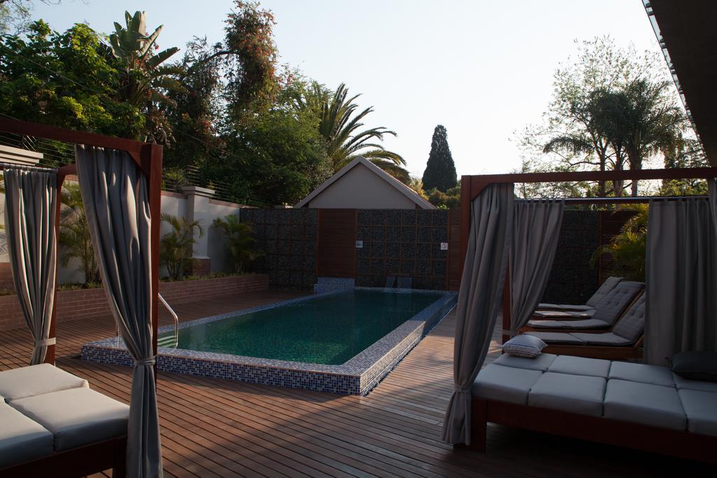 Menlyn Boutique Hotel Pretoria Exterior photo The pool at the hotel